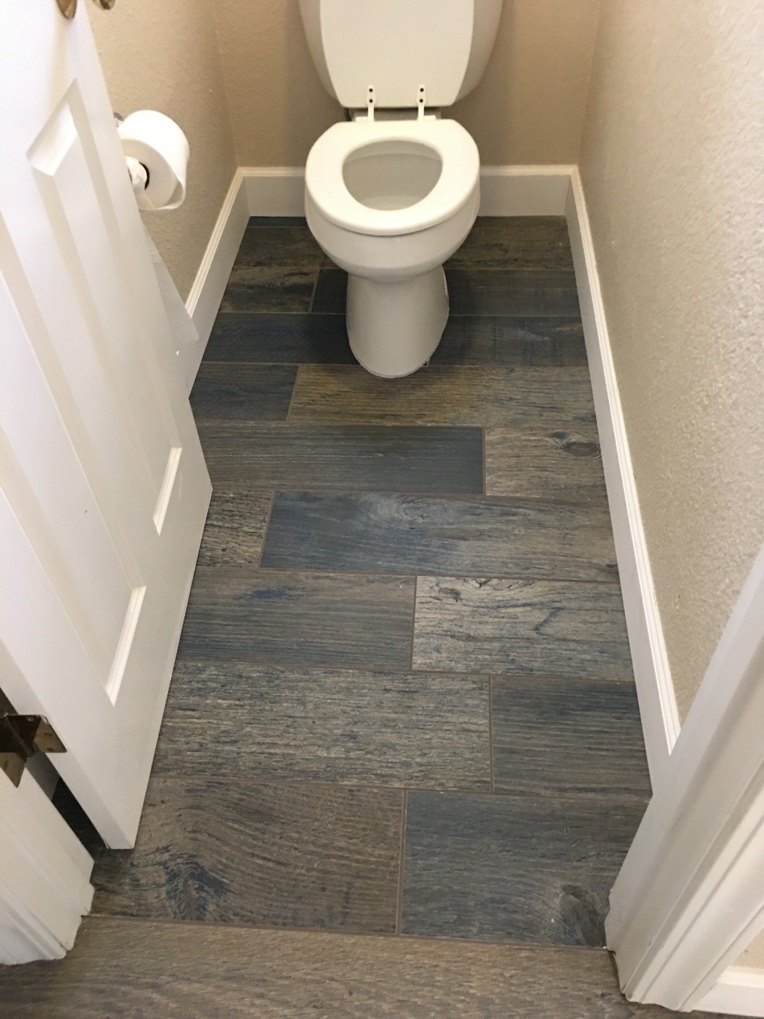Bathroom tile and baseboard detail
