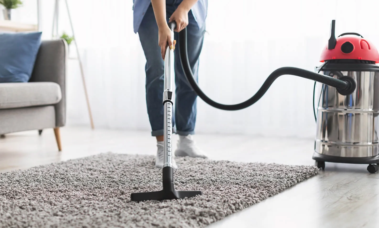 Vacuuming a shag area rug