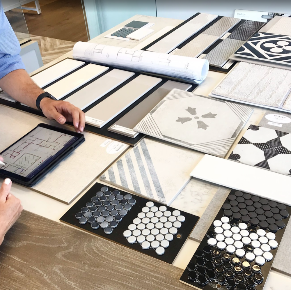 Browsing flooring samples at Pioneer Floor Coverings Showroom